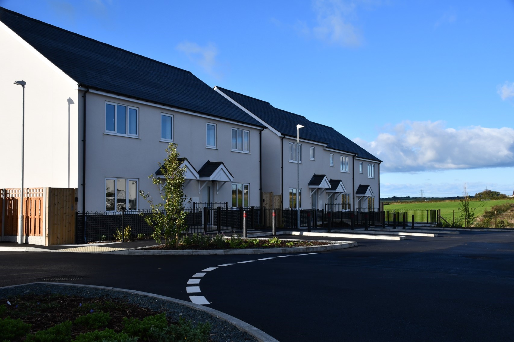 Examples of recent developments of quality and affordable homes in Rhosybol and Llanfachraeth.