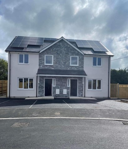 Examples of recent developments of quality and affordable homes in Rhosybol and Llanfachraeth.