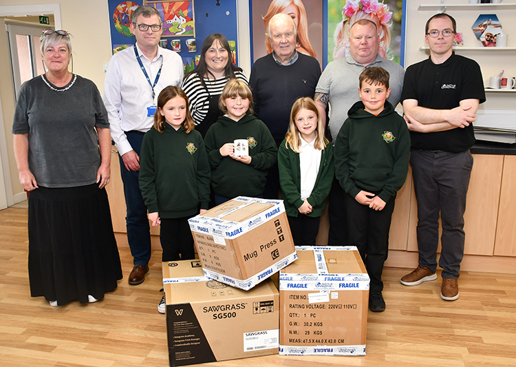 Group photo with the staff, pupils and councillors at Ysgol Henblas..